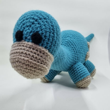 Handmade crochet dinosaur plush toy