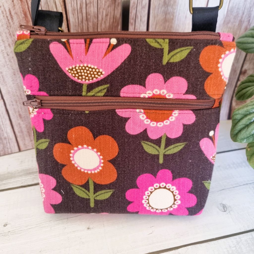 Upcycled zipped crossbody bag - funky pink flowers on brown
