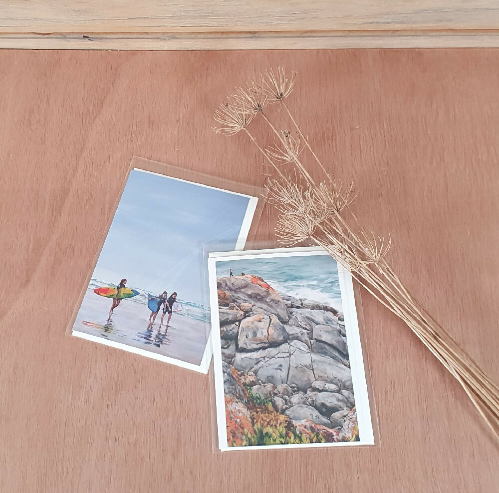 Images of paintings: Reflections of Girl Surfers (left), Windswept Beauty (right)