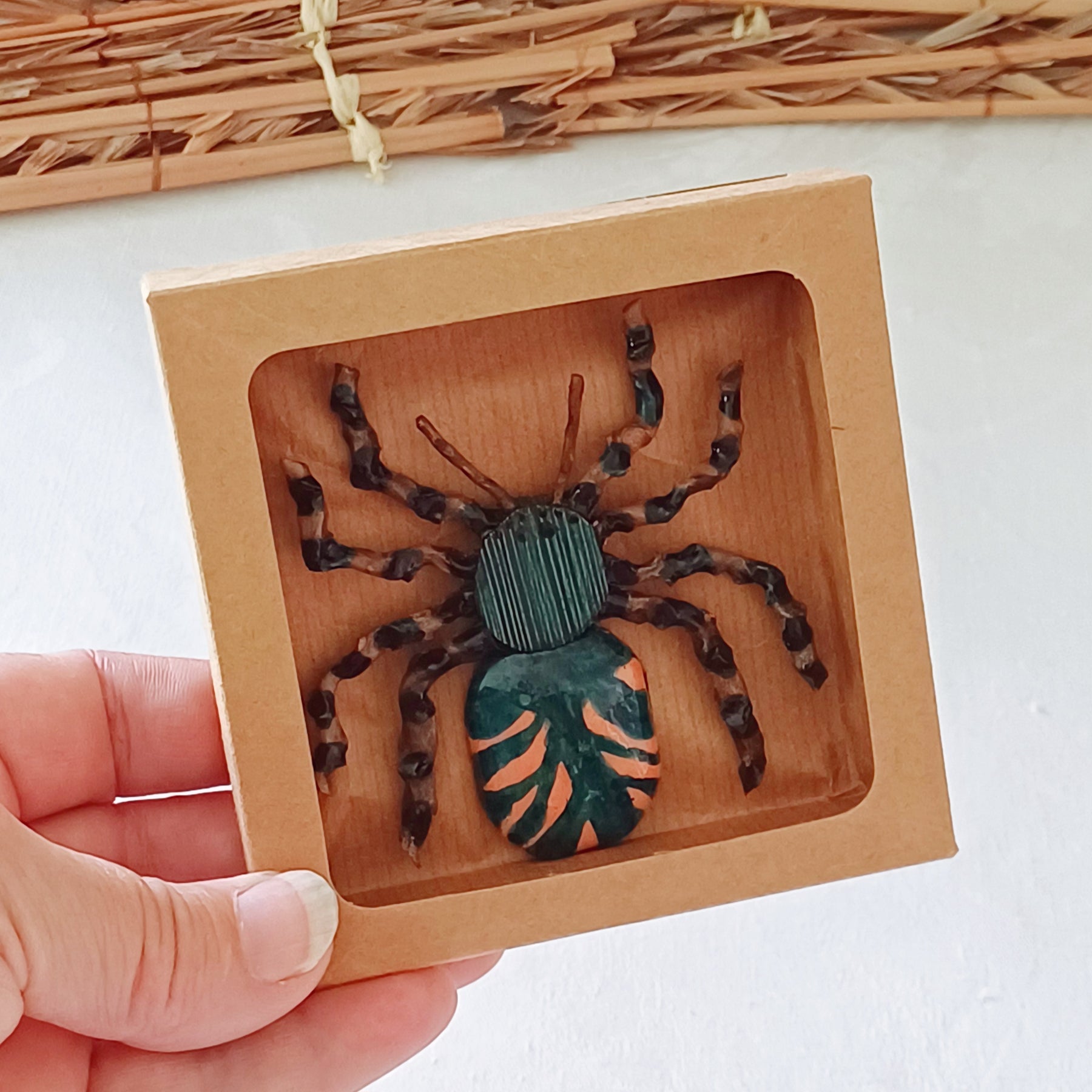 Hand painted teal palm leaf clay spider keepsake with magnet