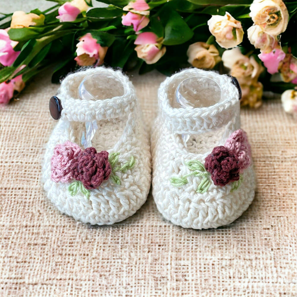 cream baby booties