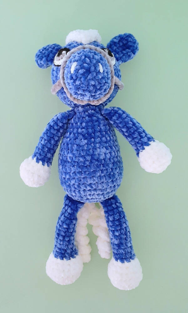 A beautifully soft, blue velvet crocheted pony