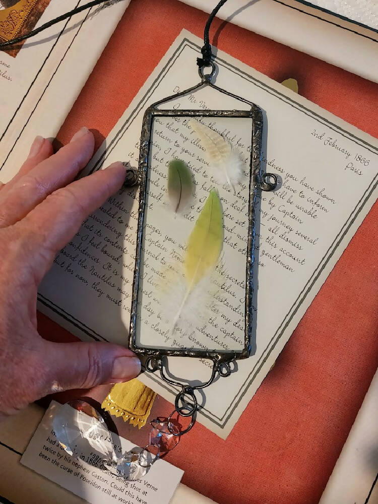 Beautiful feather suncatcher, real feathers soldered between glass with crystals