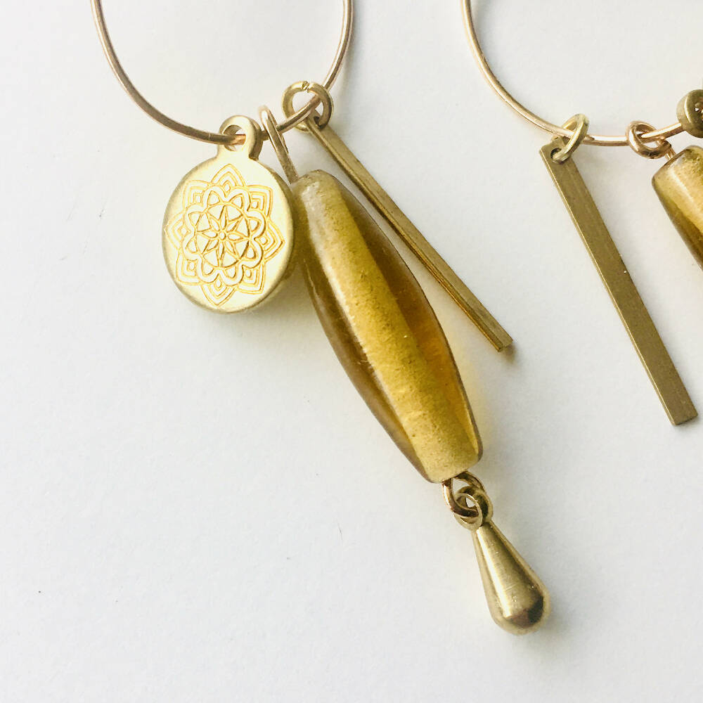 Amber lotus charm hoop dangly earrings