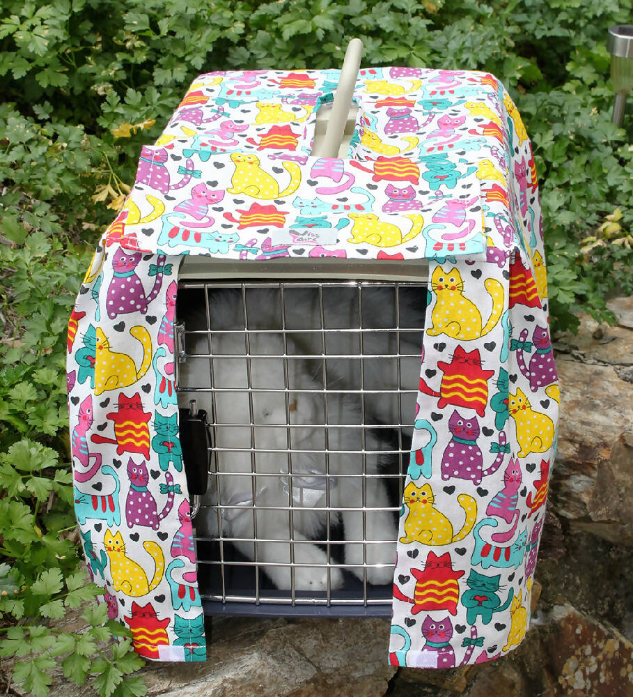 coloured cats closed door madeit