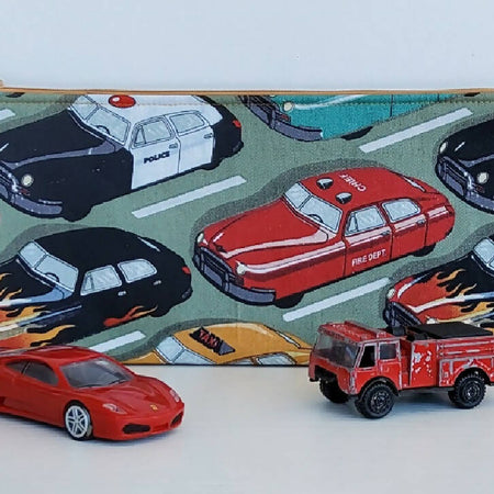 Zippered pouch with cars.