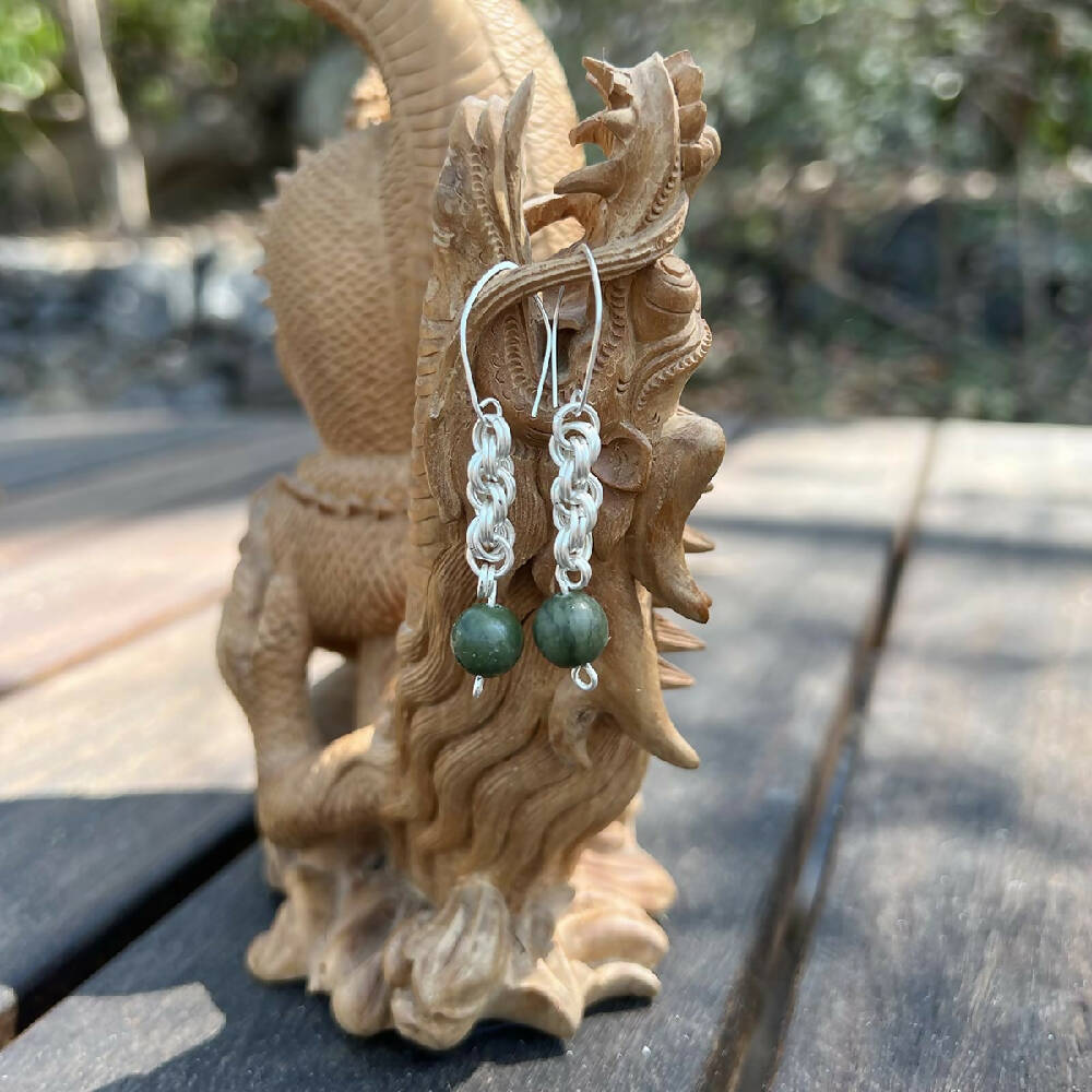Silver filled spiral + jade earrings front