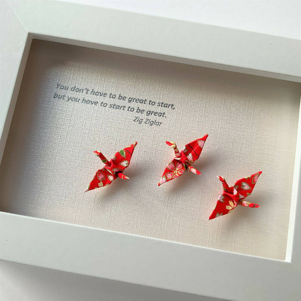 Framed artwork with quote - start to be great.