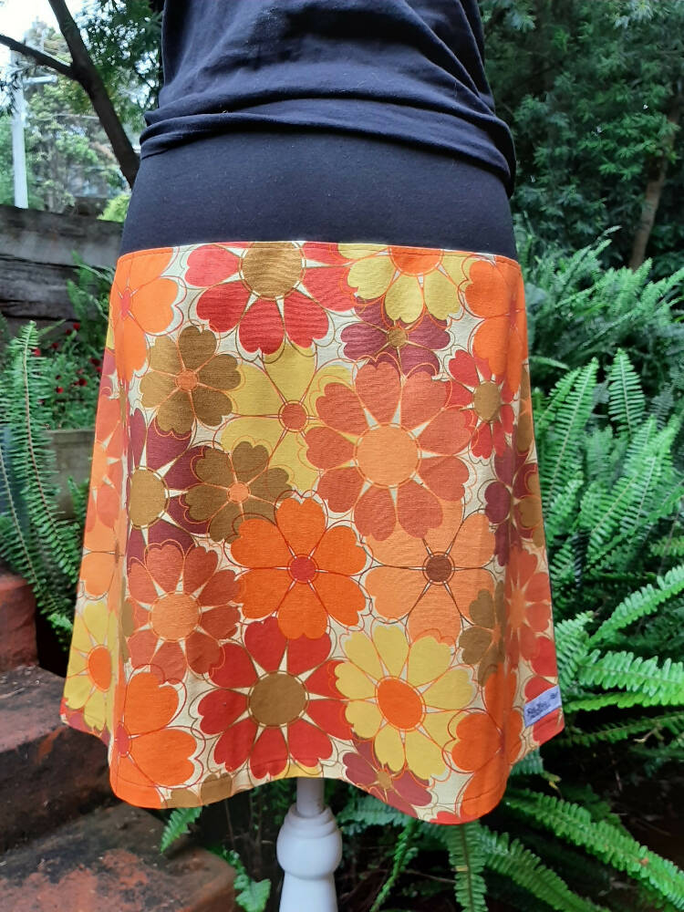 Orange flower skirt with 70s vibe