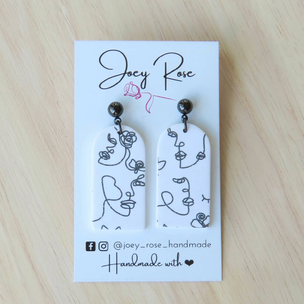 LIZZY ~ Polymer Clay Long Arch Earrings - Silhouette Faces ~ White