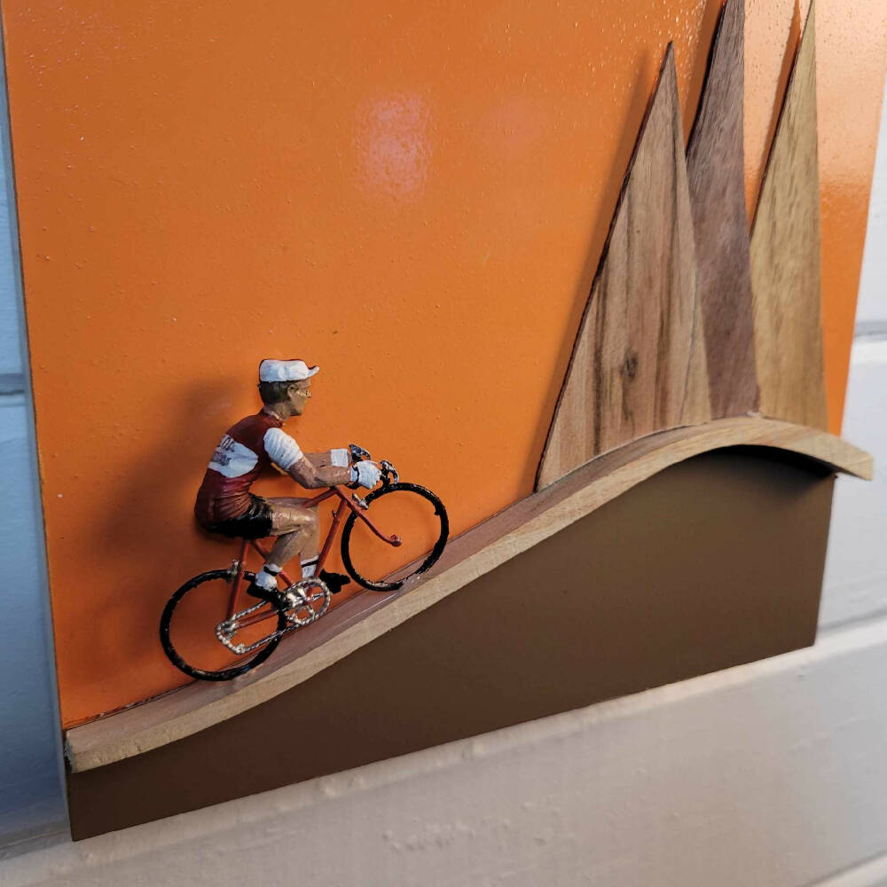 Frameless 3d composition of classic cyclist in mountains wall art