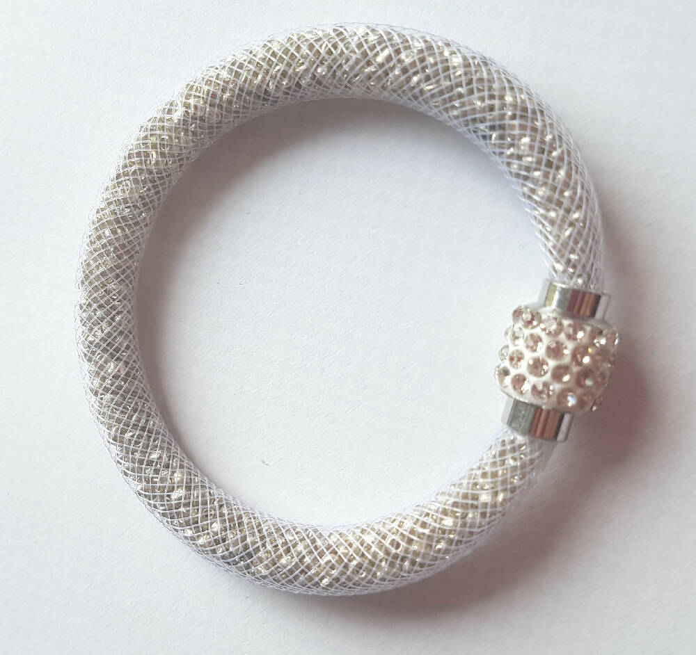 Bangle Bracelet Nylon mesh, bead filled, magnetic clasp.