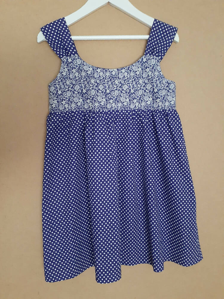 Cute size 6 child's dresses. One-Of-A-Kind Print Bodice with Contrasting Spots. Available in 2 colours.