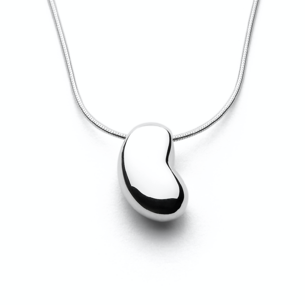 Image of handmade sterling silver Bean shaped pendant by Purplefish Designs Jewellery on silver curb chain necklace on a white background.
