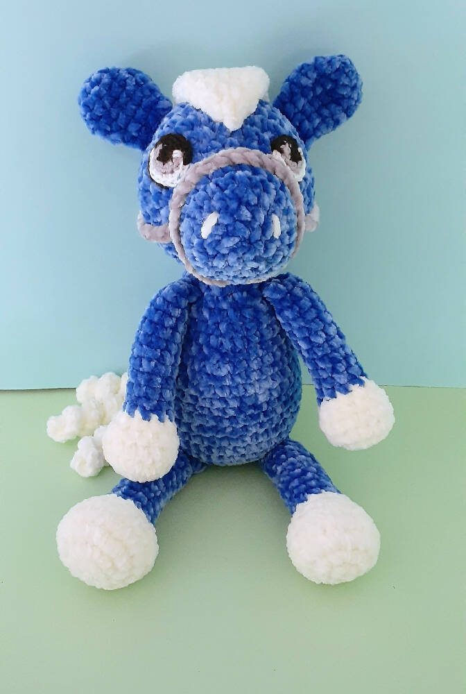 A beautifully soft, blue velvet crocheted pony