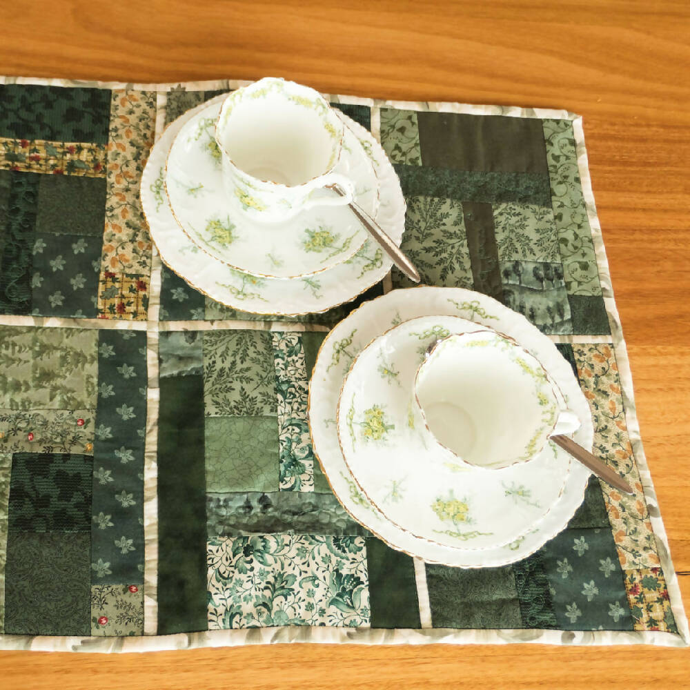 Patchwork table runner with feature quilting, reversible.