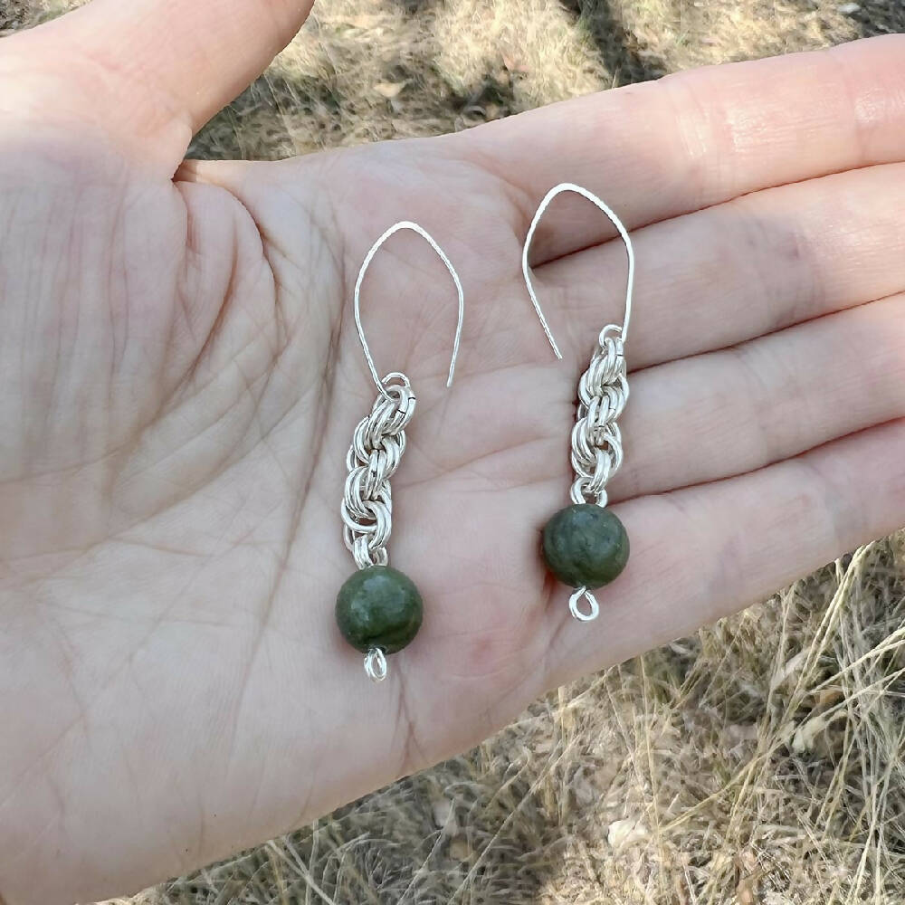 Silver filled spiral + jade earrings in hand