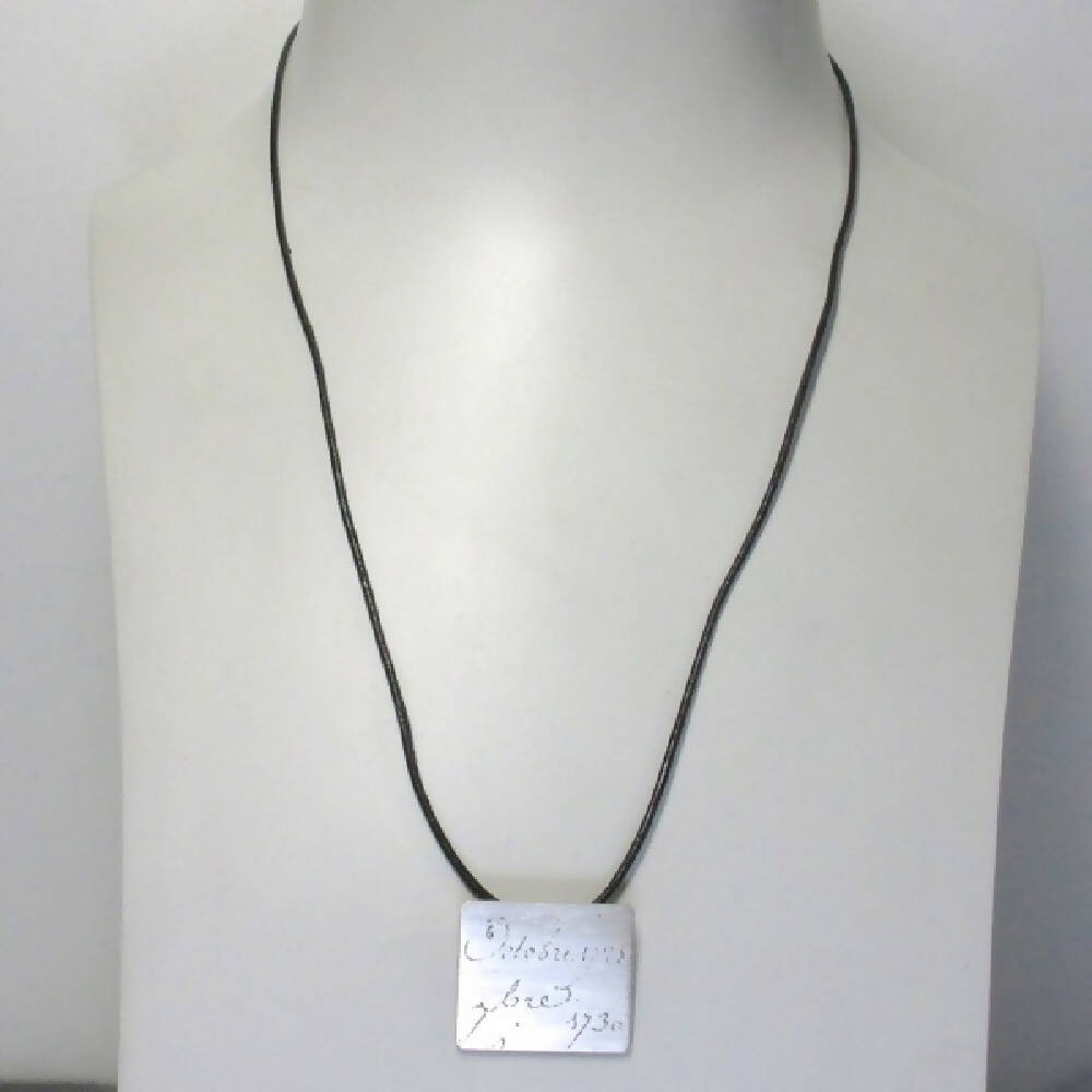 Manu Scriptum sterling silver pendant