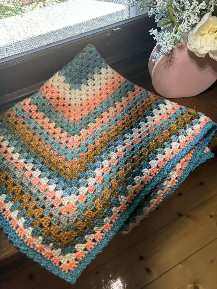 Granny Square Baby Blanket - teal and orange tones