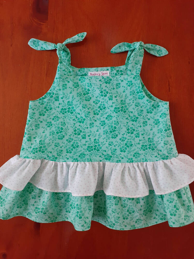 Baby's Pale Green Dresses with Contrasting Ruffles.
