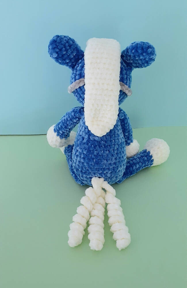 A beautifully soft, blue velvet crocheted pony