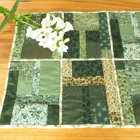 Patchwork table runner with feature quilting, reversible.