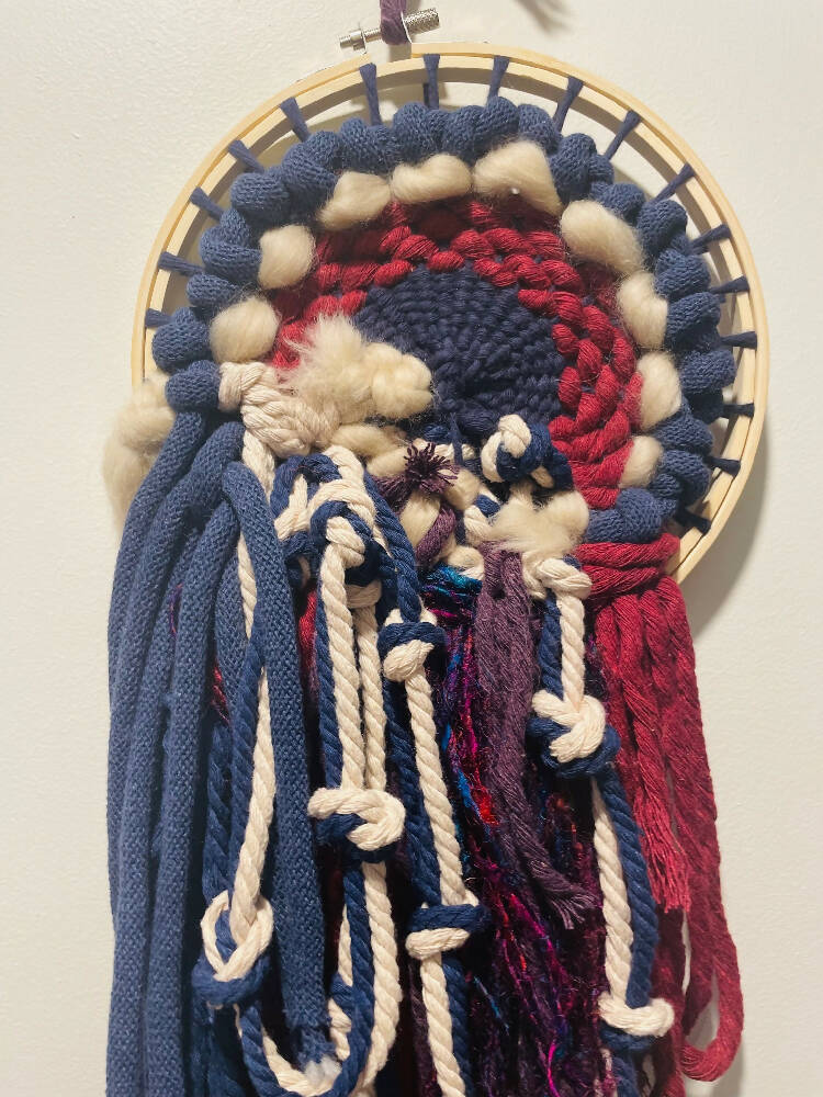blue and red wall hanging