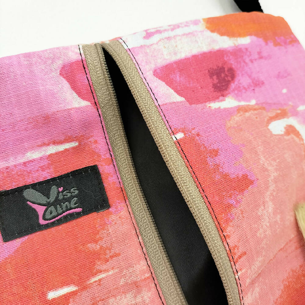 Accessory  bag with adjustable strap. Pink and orange