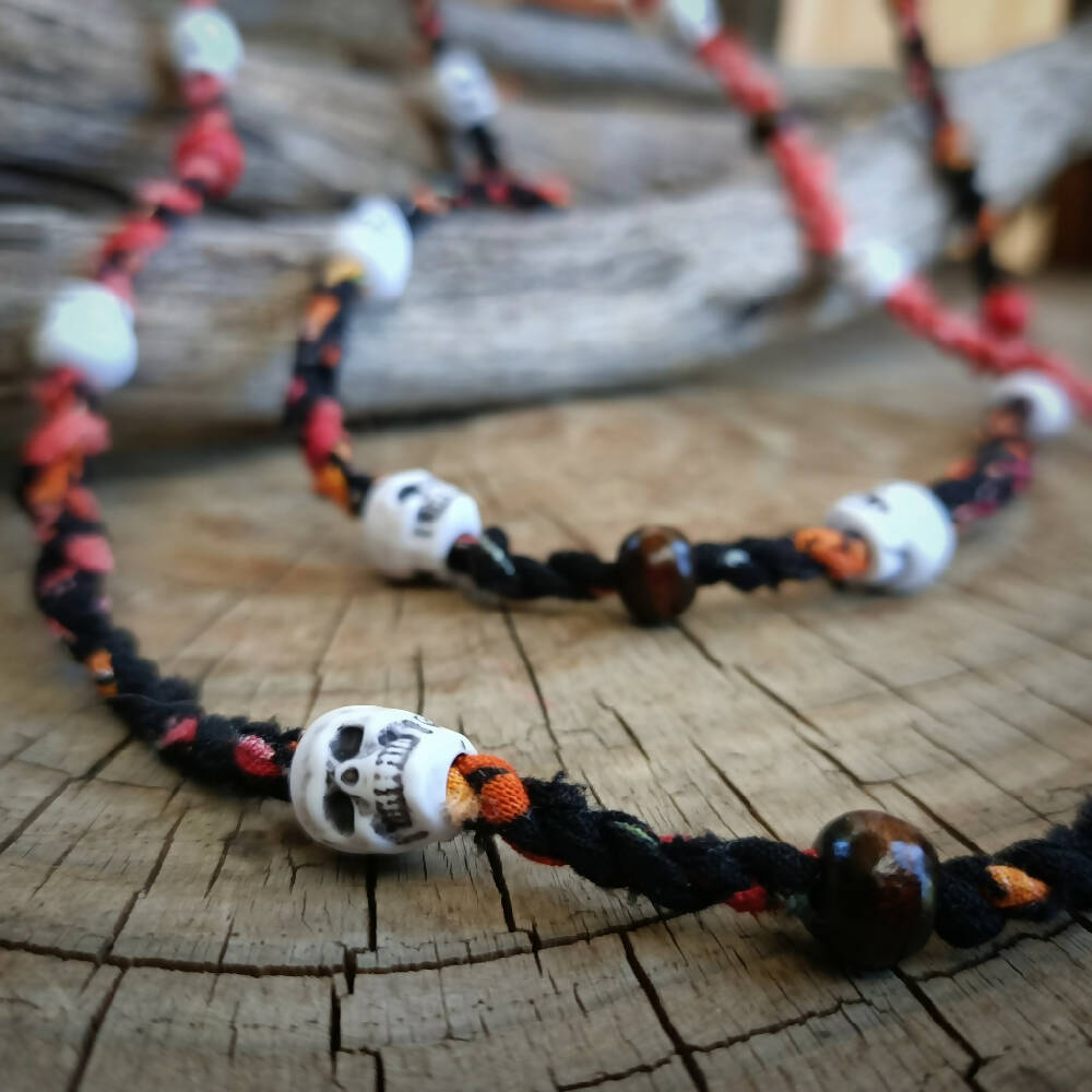 fabric necklace skulls up close -