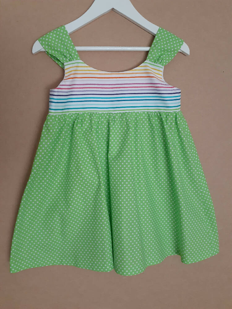 Cute size 4 child's dresses. One-Of-A-Kind Print Bodice with Contrasting Spots. Available in 2 colours.