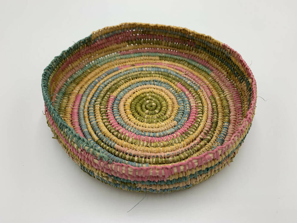 Raffia basket in blue, pink, green and natural colours