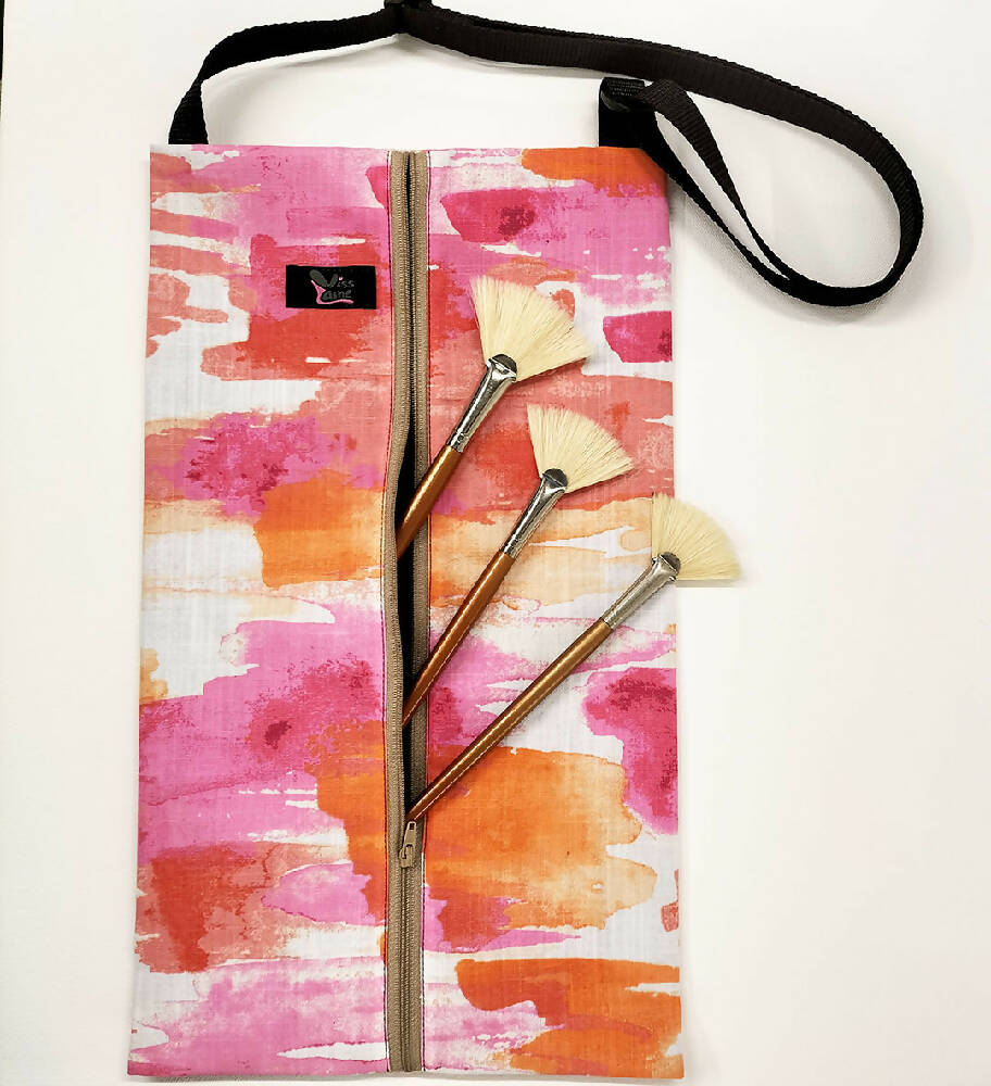 Artist brush holder waterproof bag with adjustable strap. Toiletry bag