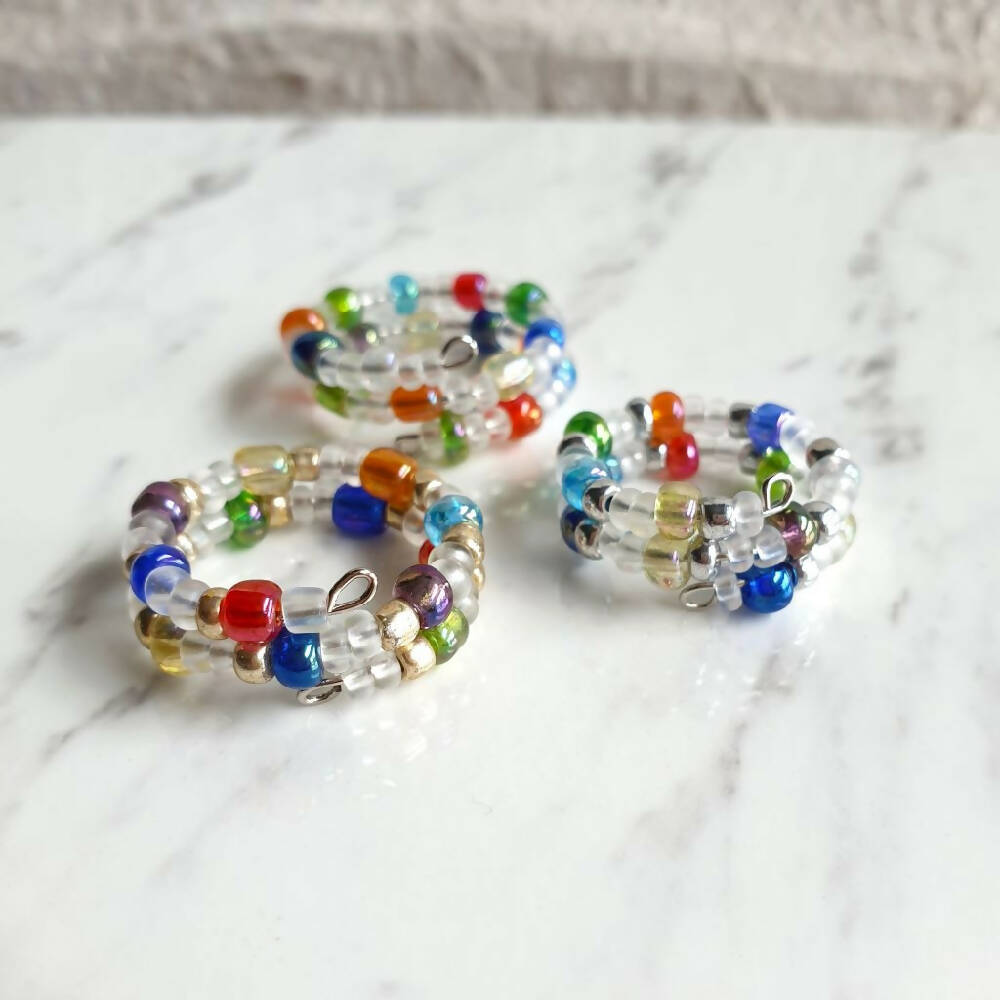 2 lined Mix Clear Luster Rainbow & Frost seed beads memory wire ring