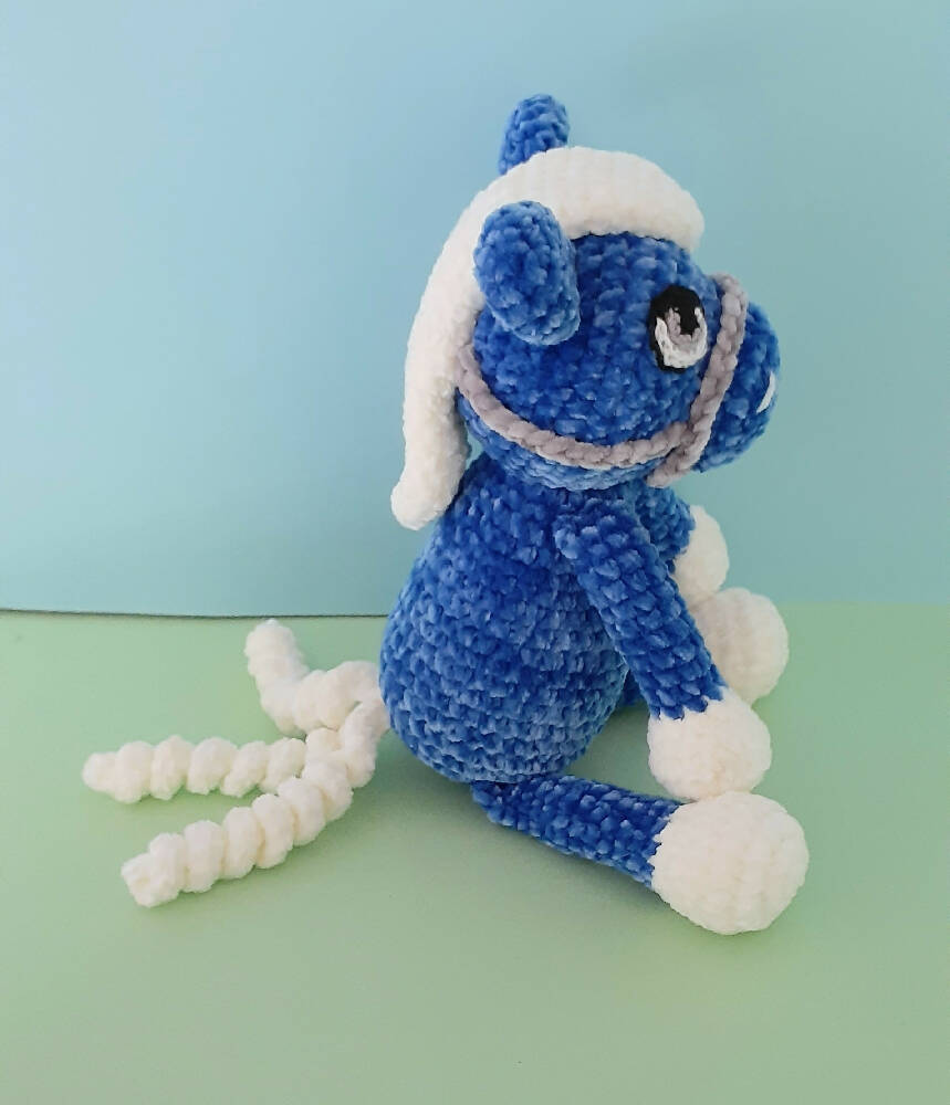 A beautifully soft, blue velvet crocheted pony