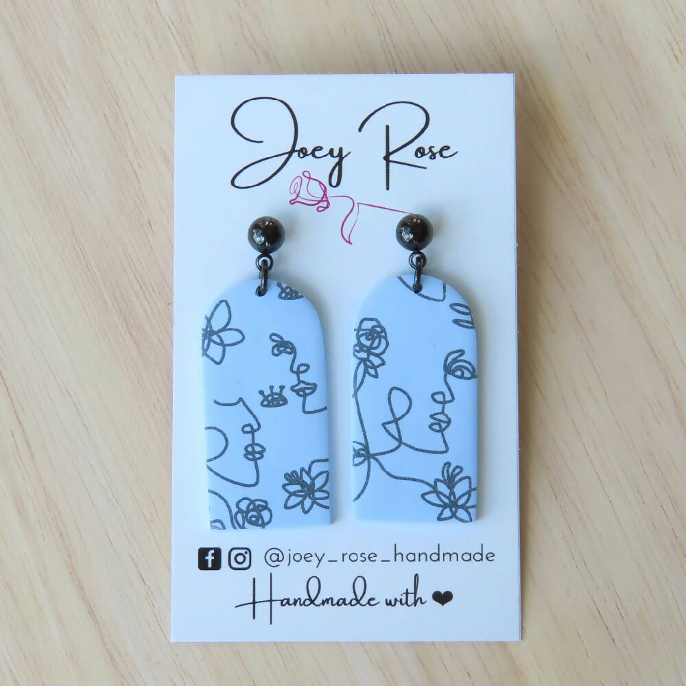 LIZZY ~ Polymer Clay Long Arch Earrings - Silhouette Faces ~ White