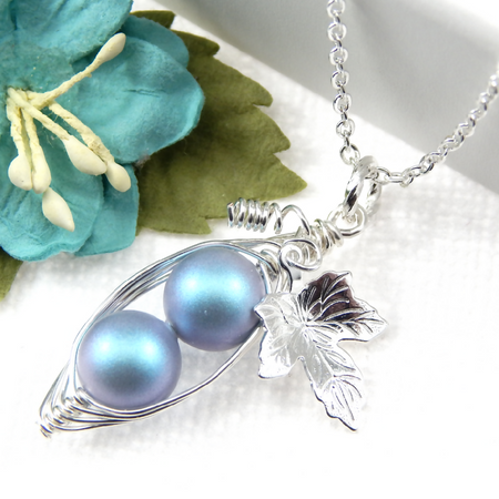 Two Peas In A Pod Iridescent Light Blue Necklace