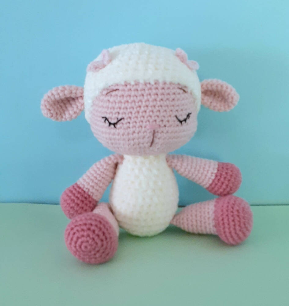 Adorable crocheted lamb baby toy