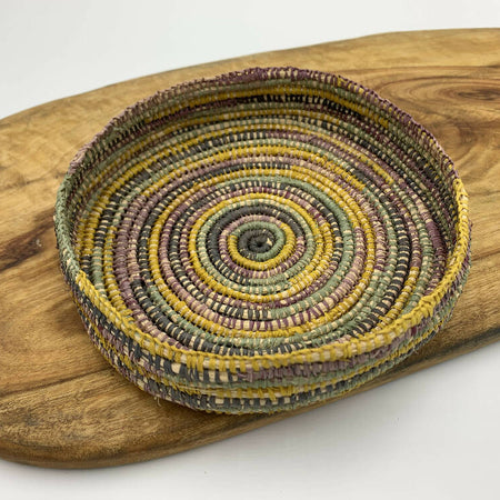 Raffia basket in mustard yellow, grey, green, purple and natural colours