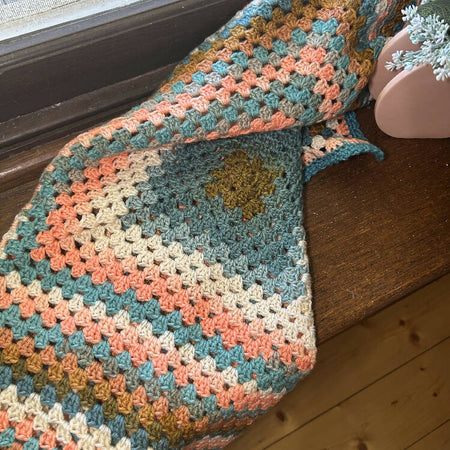 Granny Square Baby Blanket - teal and orange tones
