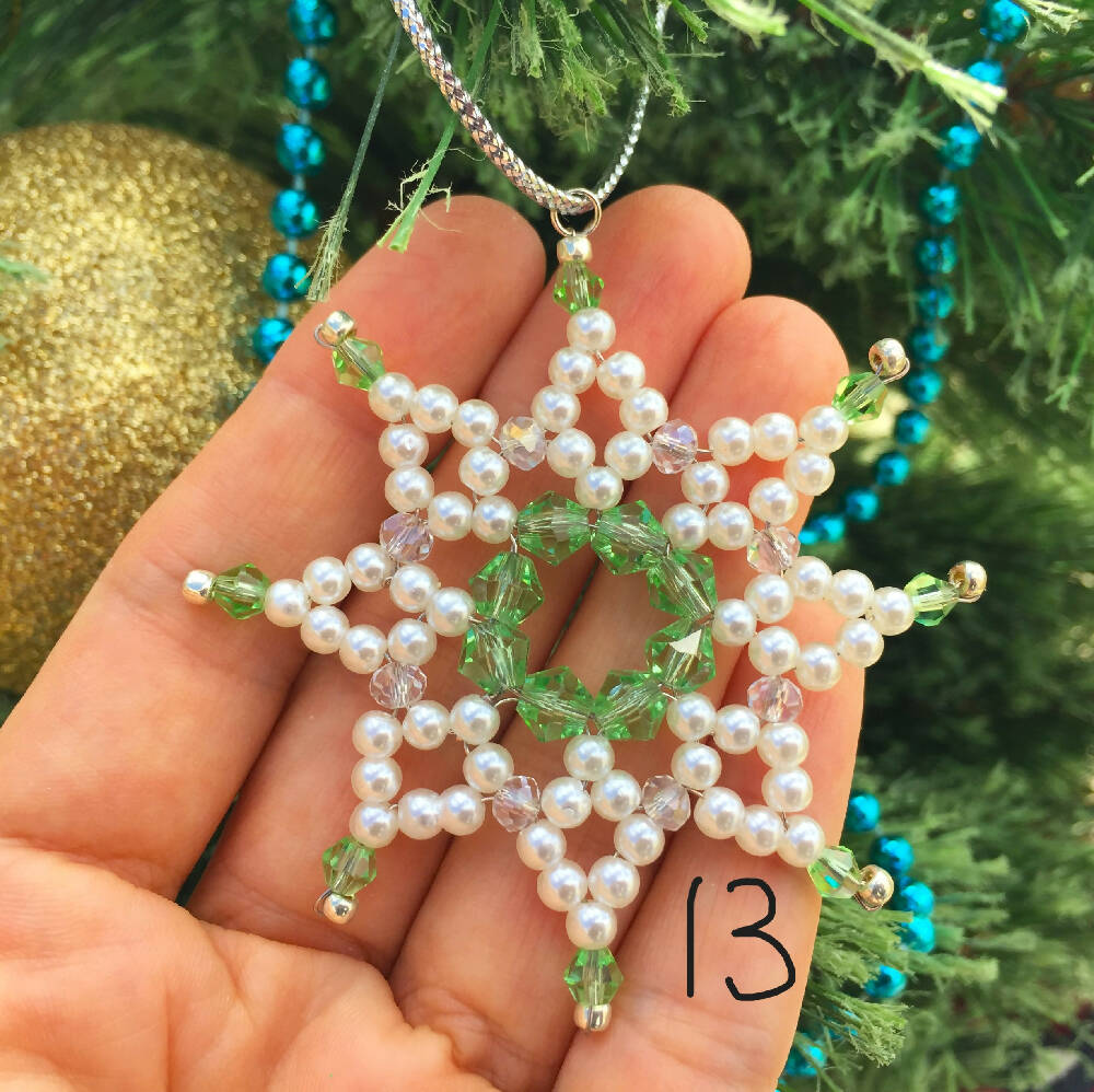 Naryanabeads beaded snowflake made of light green crystals and beige faux peral beads