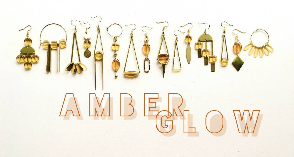 Amber lotus charm hoop dangly earrings
