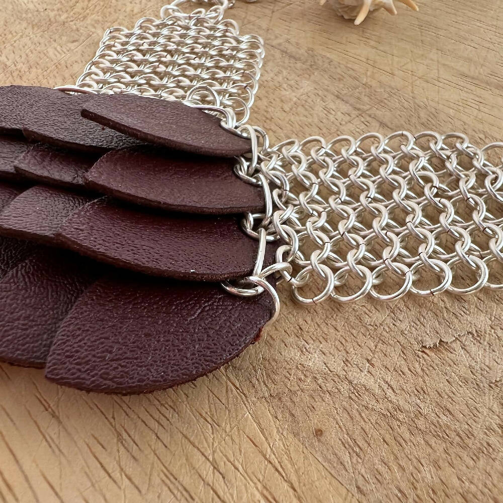 Chain & leather scales necklace detail