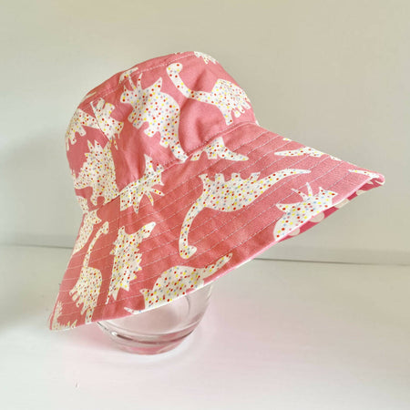Summer hat in fairy bread dinos fabric