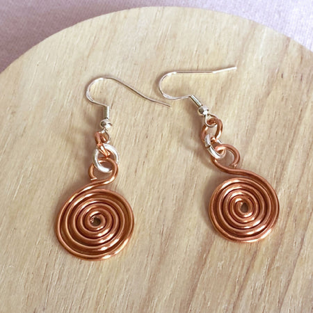 Copper and silver spiral two-tone dangle earrings