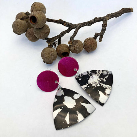 Black printed anodised aluminium earrings with pink studs