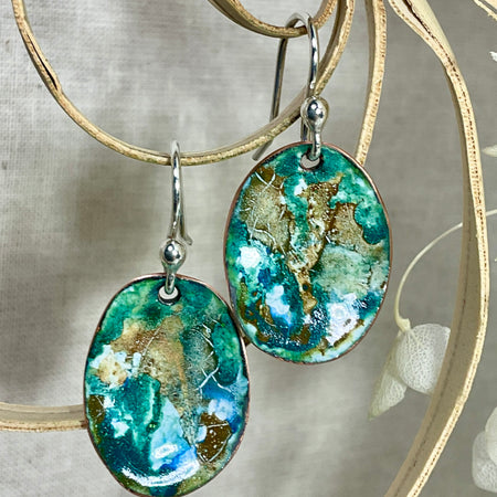 Blue and earthy brown oval abstract enamel earrings. Handmade