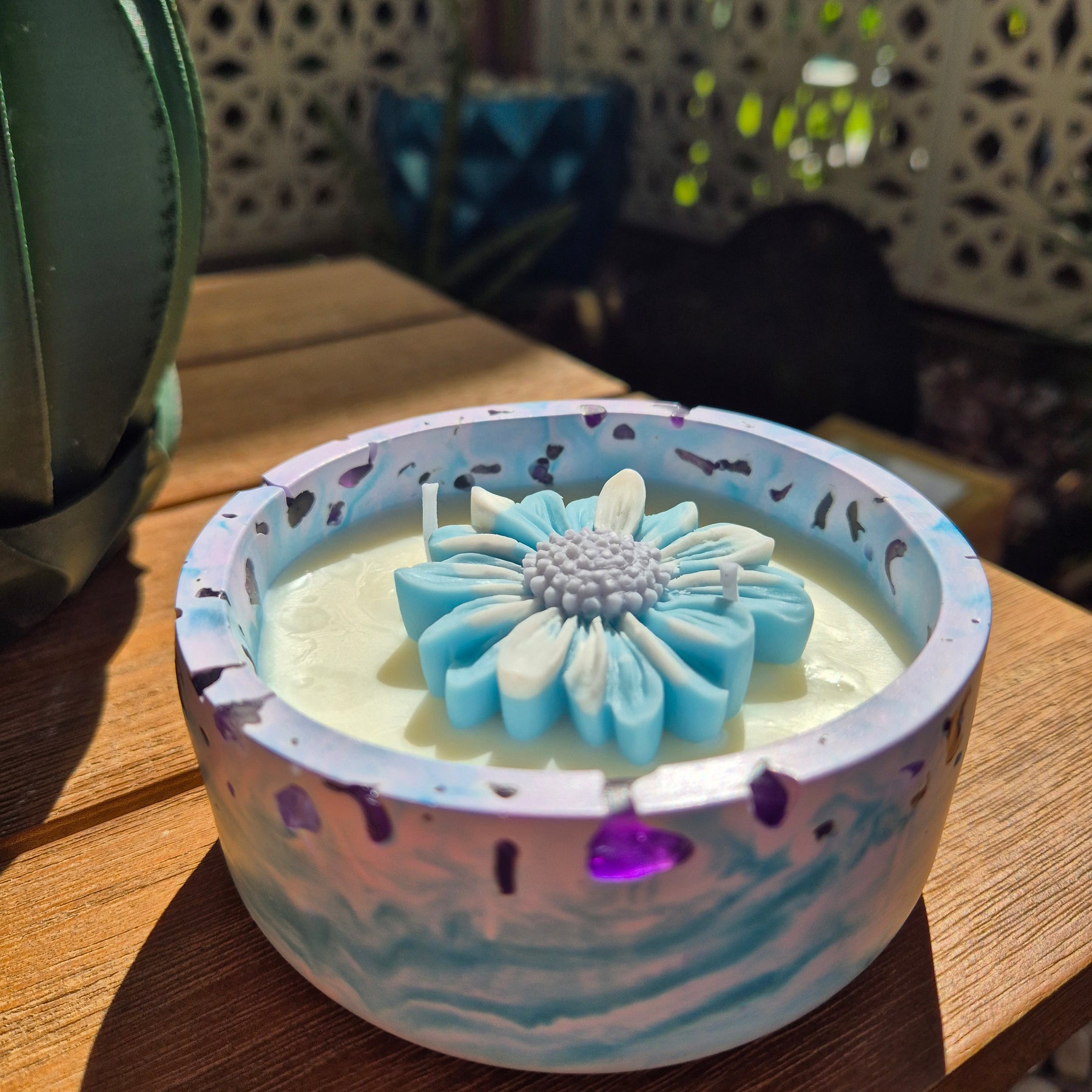 Round blue and purple concrete bowl candle with amethyst stones