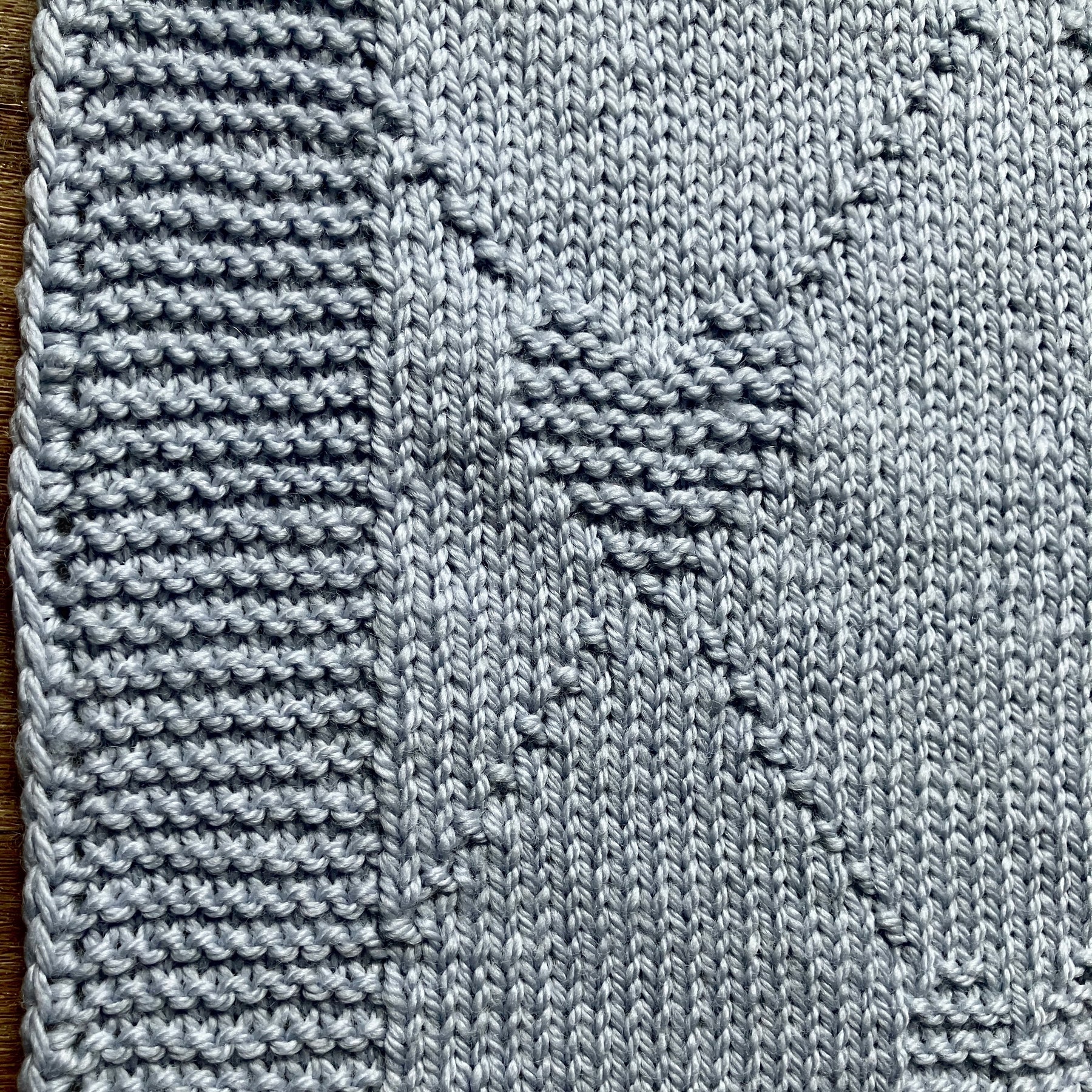 Baby shawl - hugs & kisses design - hand-knitted in Australian wool - moonflower blue