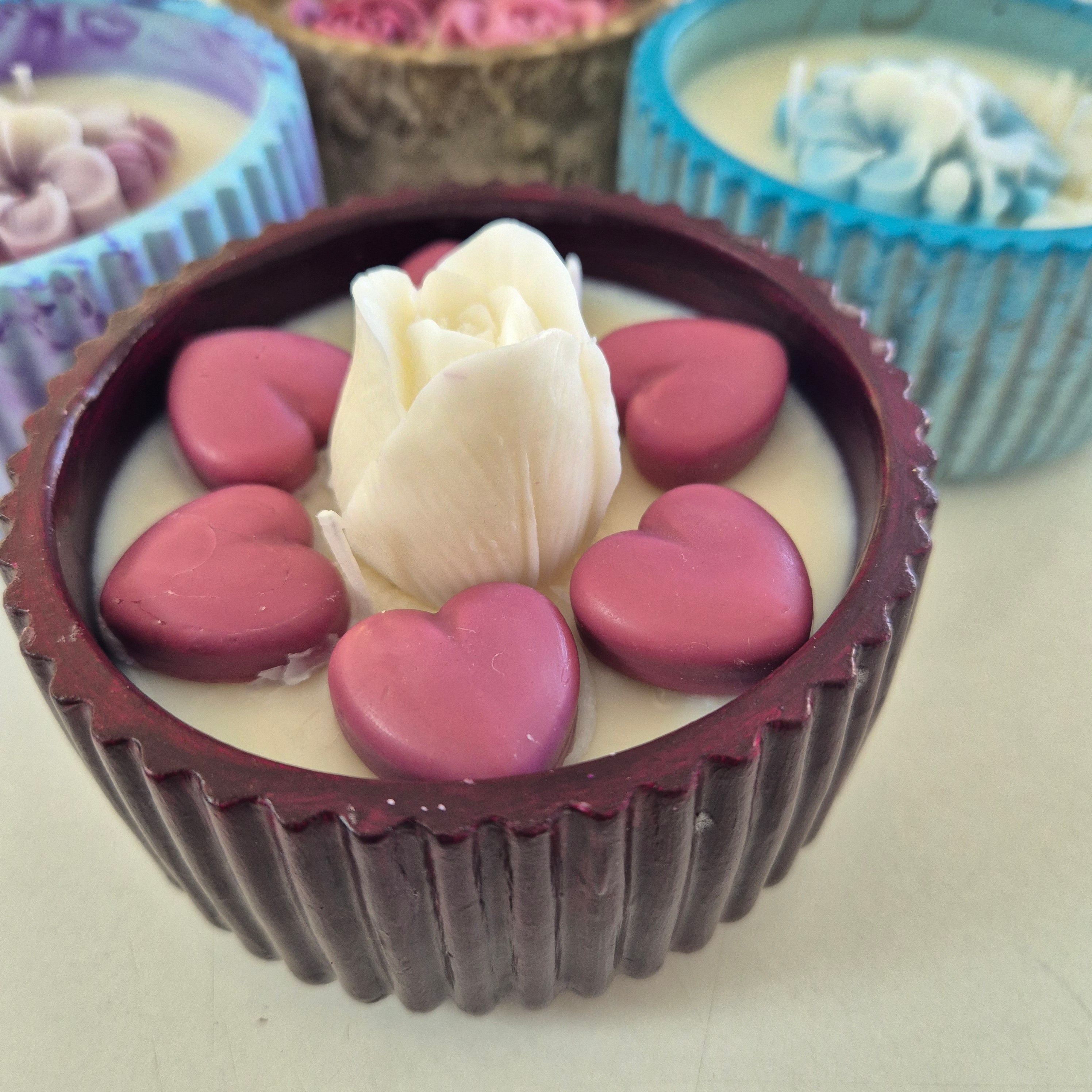 Round burgundy concrete bowl candle with tulip flower