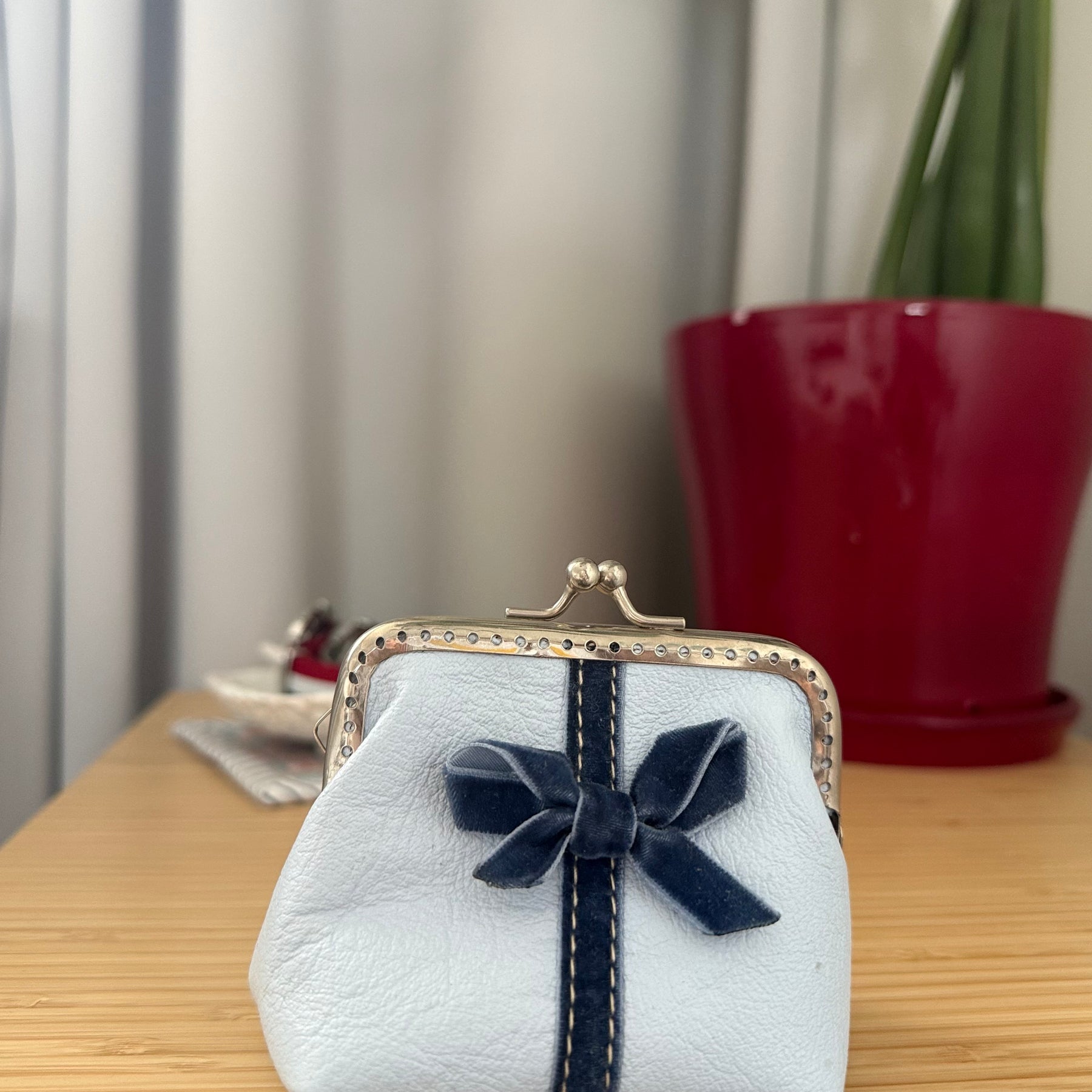 Coin purse with bow accent